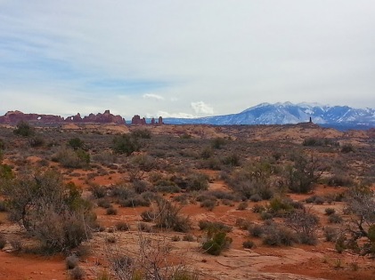 I figured out how to use the panorama feature on my phone- which then got used pretty much all weekend.  Here you can see the La Sal Mountains to the south, and the window arches to the left.