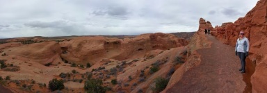 Standing on a ledge just around the corner from Delicate Arch